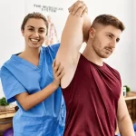 a person stretching a person's arm